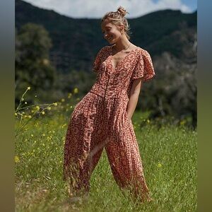NWT Free People Layla One Piece Jumpsuit Rust Orange Geo Print Size Large